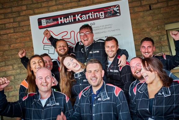 Photograph of a group who have taken part in Go Karting