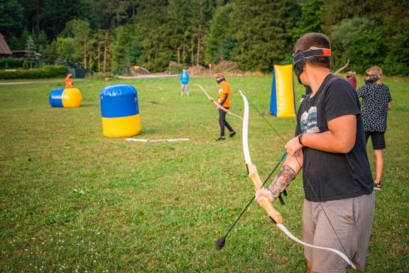 Contestants playing Archery tag