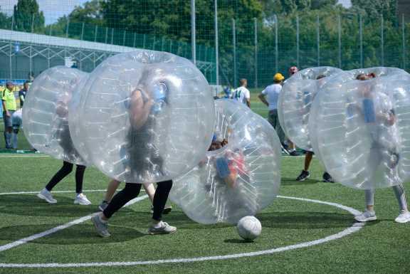 Contestants playing bubble football