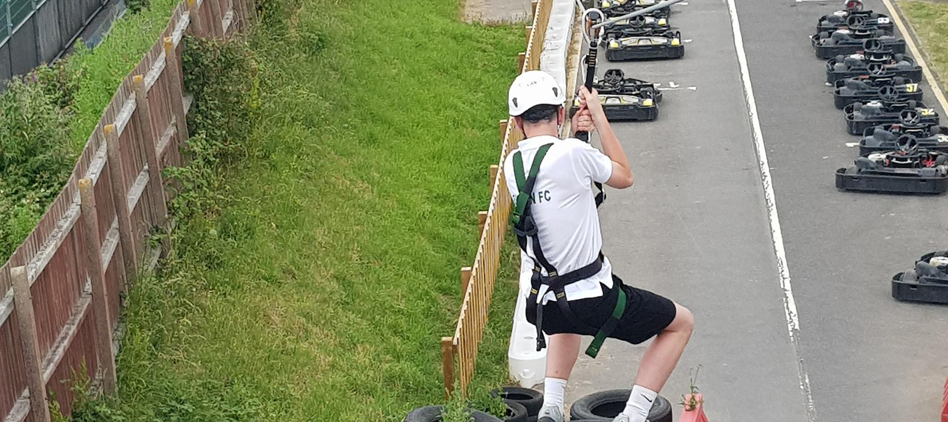 person on the high ropes